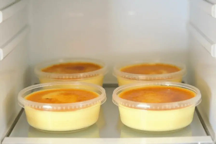 Classic crème brûlée with caramelized sugar crust and fresh berries Storing Crème Brûlée Safely